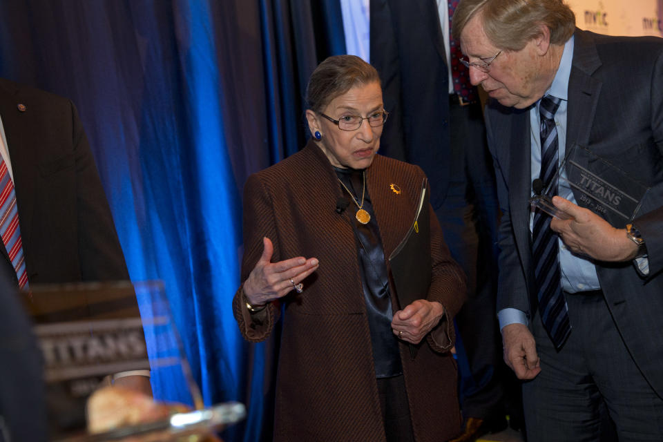 Supreme Court Justice Ruth Bader Ginsburg, left, talks with former Solicitor General Ted Olson, after she spoke to the Northern Virginia Technology Council, Tuesday, Dec. 17, 2013, in Reston, Va. (AP Photo/Jacquelyn Martin)