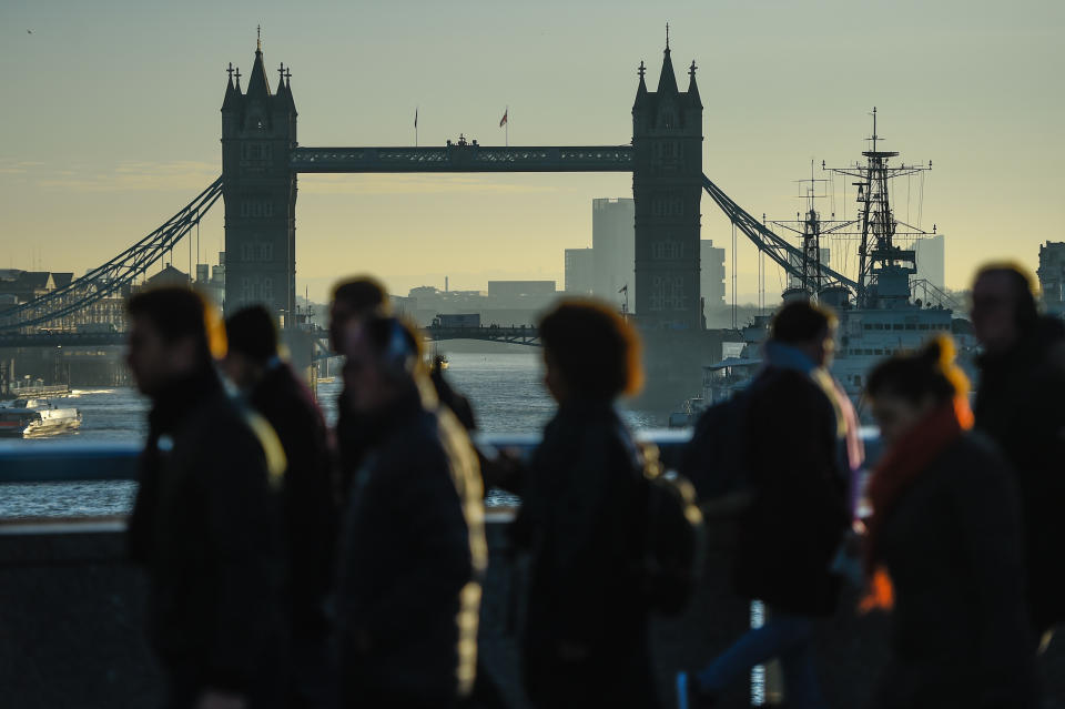 LONDON, ENGLAND - DECEMBER 02: Commuters cross London Bridge, after it was reopened following the terror attack, on December 2, 2019 in London, England. Usman Khan, a 28 year old former prisoner convicted of terrorism offences, killed two people in Fishmongers' Hall at the North end of London Bridge on Friday, November 29, before continuing his attack on the bridge. Mr Khan was restrained and disarmed by members of the public before being shot by armed police. (Photo by Peter Summers/Getty Images)