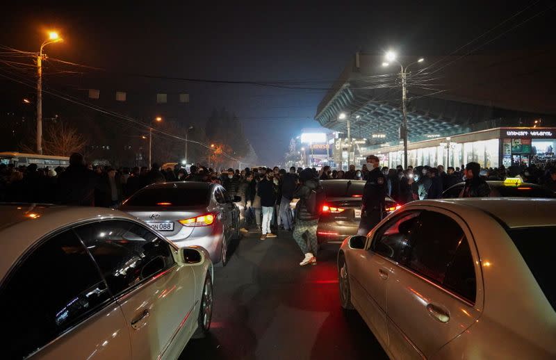 People attend an opposition rally in Yerevan