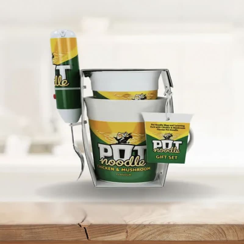 <p><a href="https://go.redirectingat.com?id=74968X1596630&url=https%3A%2F%2Fwww.prezzybox.com%2Fpot-noodle-mug-spinning-fork-set-chicken-mushroom.aspx&sref=https%3A%2F%2Fwww.esquire.com%2Flifestyle%2Fg41381264%2Fdirty-santa-gift-ideas%2F" rel="nofollow noopener" target="_blank" data-ylk="slk:Shop Now;elm:context_link;itc:0;sec:content-canvas" class="link ">Shop Now</a></p><p>Pot Noodle Mug & Spinning Fork Set </p><p>prezzybox.com</p><p>£20.00</p>