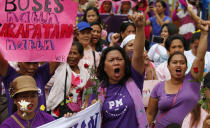 <p>Protesters shout slogans during a rally to mark International Women’s Day on March 8, 2018, in Manila, Philippines. Hundreds of women activists in pink and purple shirts protested against President Rodrigo Duterte in the Philippines on Thursday, as marches and demonstrations in Asia kicked off International Women’s Day. (Photo: Bullit Marquez/AP) </p>