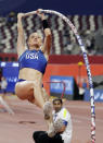 FILE - In this Sept. 29, 2019, file photo, Katie Nageotte, of the United States, competes in the women's pole vault final at the World Athletics Championships in Doha, Qatar. Three of the leading women’s pole vaulters will take their turn to compete in the second edition of the Ultimate Garden Clash. Katerina Stefanidi of Greece, Katie Nageotte of the United States and Alysha Newman of Canada will participate in the event but won’t be competing in their backyards since they don’t have the equipment at home. They will instead be at nearby training facilities.(AP Photo/Hassan Ammar, File)