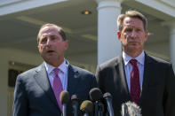 Health and Human Services Secretary Alex Azar, left, and acting FDA Commissioner Ned Sharpless speak with reporters after a meeting about vaping with President Donald Trump in the Oval Office of the White House, Wednesday, Sept. 11, 2019, in Washington. (AP Photo/Alex Brandon)