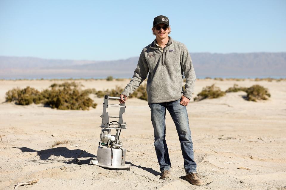 Ross Wilson, Imperial Irrigation District environmental specialist, poses for a portrait with a PI-SWERL, which stands for Portable In-Situ Wind ERosion Lab, in Salton City, Calif., on Wednesday, Dec. 13, 2023. | Kristin Murphy, Deseret News