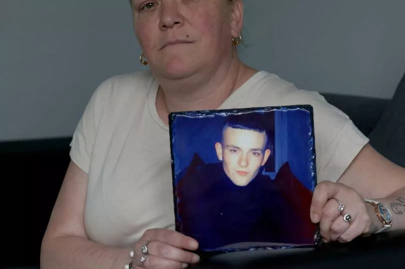 Julie Weatherson with a picture of her murdered son Bradley Tams