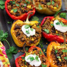 <p>Stuffed peppers are one of the easiest dinners of all time: Just cut a handful in half, load them up with goodies, and bake away.<span> (Plus, they're so delicious you might even forget you're eating veggies in the first place.)</span></p><p><strong>Get the recipe at <a rel="nofollow noopener" href="http://veganhuggs.com/quinoa-stuffed-peppers/" target="_blank" data-ylk="slk:Vegan Huggs;elm:context_link;itc:0;sec:content-canvas" class="link ">Vegan Huggs</a>.</strong><br></p>