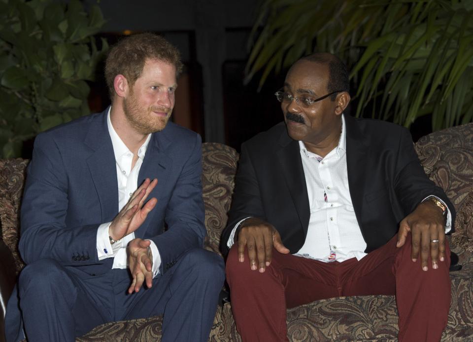 Prime Minister of Antigua and Barbuda Gaston Browne alongside Prince Harry during the British royal's official visit to Antigua on Nov. 21, 2016