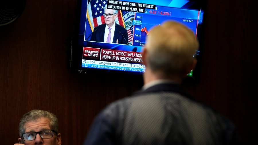 Traders on the floor at the New York Stock Exchange watch Federal Reserve Chair Jerome Powell’s news conference after the Federal Reserve interest rate announcement in New York, Wednesday, Feb. 1, 2023.