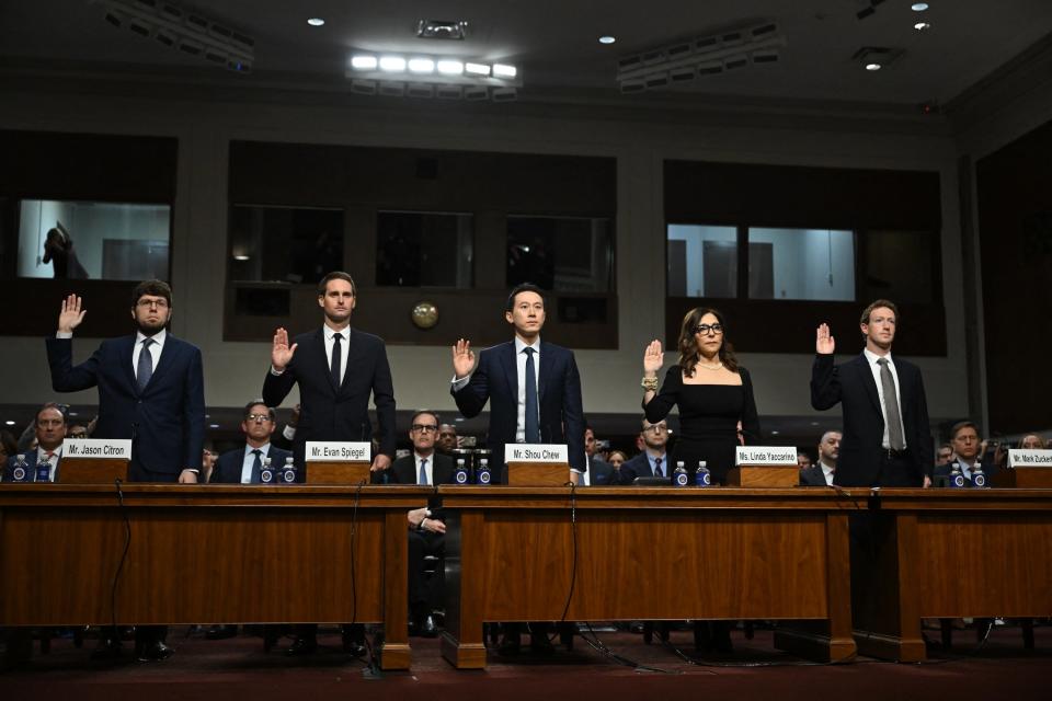 Jason Citron, CEO of Discord; Evan Spiegel, CEO of Snap; Shou Zi Chew, CEO of TikTok; Linda Yaccarino, CEO of X; and Mark Zuckerberg, CEO of Meta, are sworn in during the US Senate Judiciary Committee hearing, "Big Tech and the Online Child Sexual Exploitation Crisis," in Washington, DC,