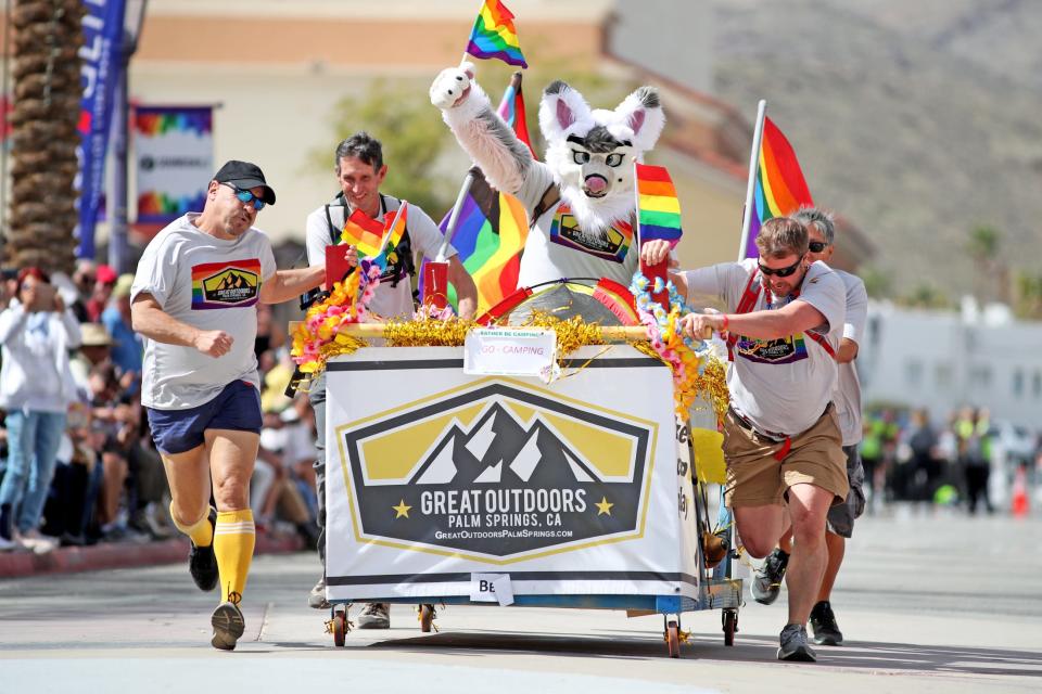 Competitors take part in the annual Bed Race and Parade during Cathedral City LGBT Days in downtown Cathedral City, Calif., on Sunday, March 5, 2023. 