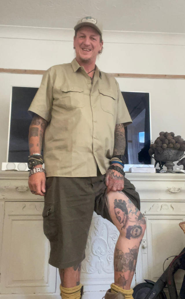 Pictured Michael Purkiss. A tattoo artist has tattooed a portrait of the Queen on his leg to pay tribute to her, as they share the same birthday. See SWNS story SWLNtattoo. Michael Purkiss, 57, was so upset by the death of Queen Elizabeth II that he decided to tattoo a portrait of her just above his leg knee. He decided to get the tattoo as he has the same birthday as the Queen, and he used to joke with people that every year she would send him a cake. Michael was also 'really sad' when he found out the Queen had passed away. 