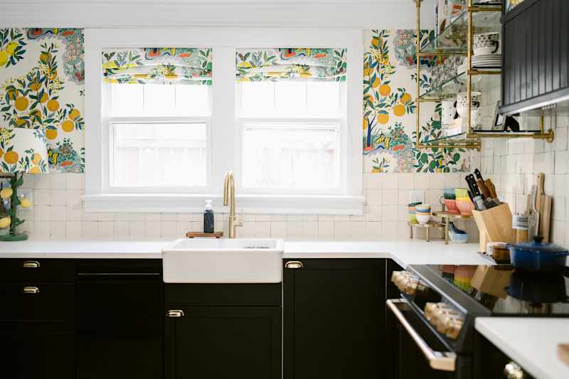 Botanical wallpaper and curtains in newly renovated kitchen.