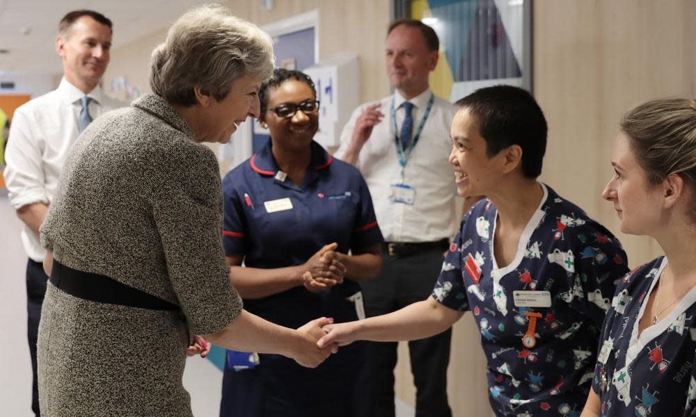 Prime minister Theresa May and health secretary Jeremy Hunt (far left) meeting nurses during a visit to the Royal Free Hospital in London earlier this month