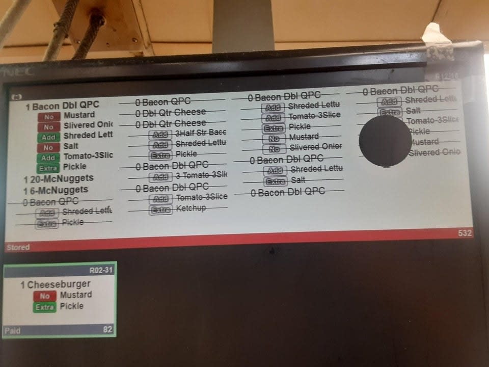 An order screen with dozens of items crossed out and and finally just one cheeseburger ordered