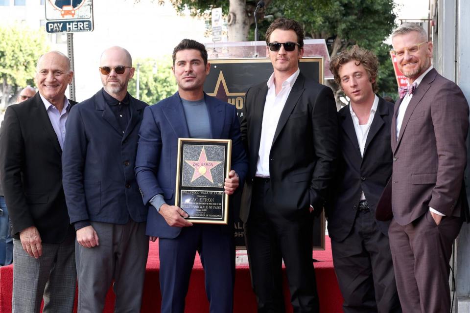 PHOTO: (L-R) President and CEO for Hollywood Chamber Steve Nissen, Sean Durkin, Zac Efron, Miles Teller, Jeremy Allen White and Marc Malkin attend the Hollywood Walk of Fame Star Ceremony Honoring Zac Efron on Dec. 11, 2023 in Hollywood, Calif. (Leon Bennett/Getty Images)