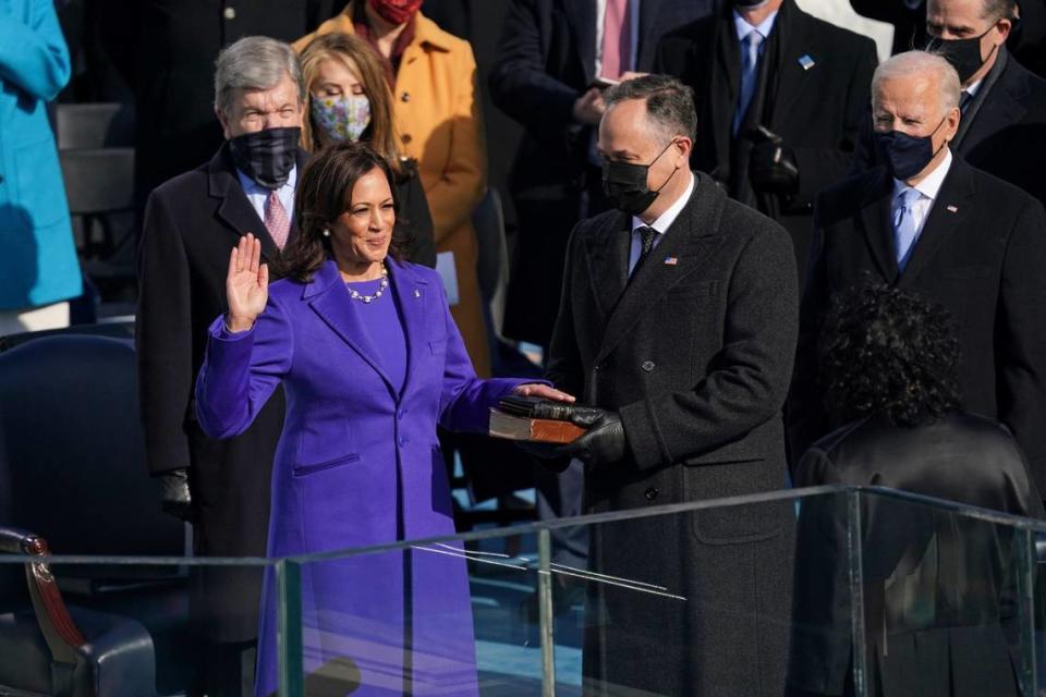 Kamala Harris is sworn in as vice president of the United States by Supreme Court Justice Sonia Sotomayor as her husband Doug Emhoff holds the Bible during the 59th Presidential Inauguration at the U.S. Capitol in Washington, Wednesday, Jan. 20, 2021.