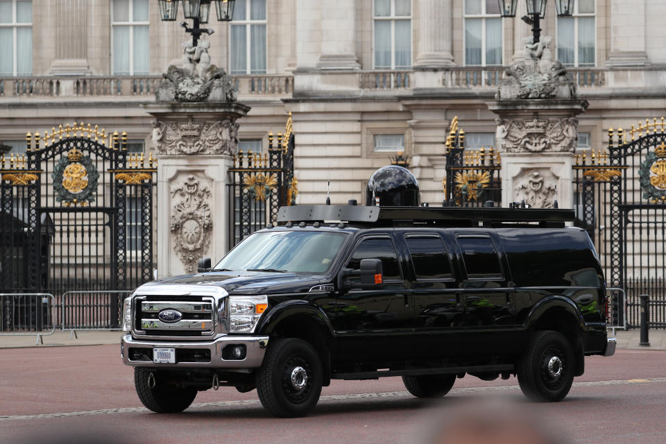 Part of the President's motorcade drives past Buckingham Palace, London, during the first day of a state visit to the UK by US President Donald Trump.