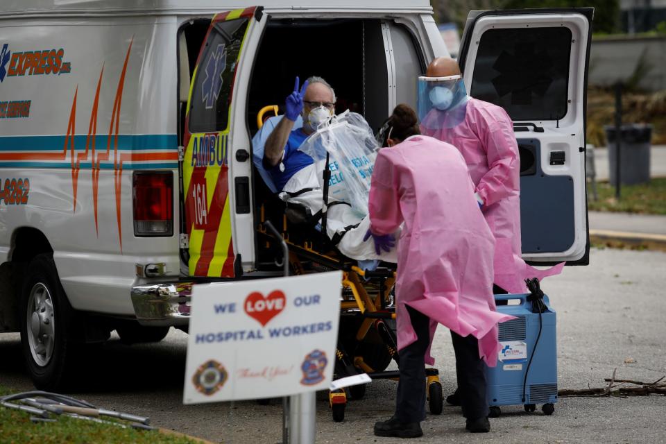 florida coronavirus patient stretcher ambulance fort lauderdale