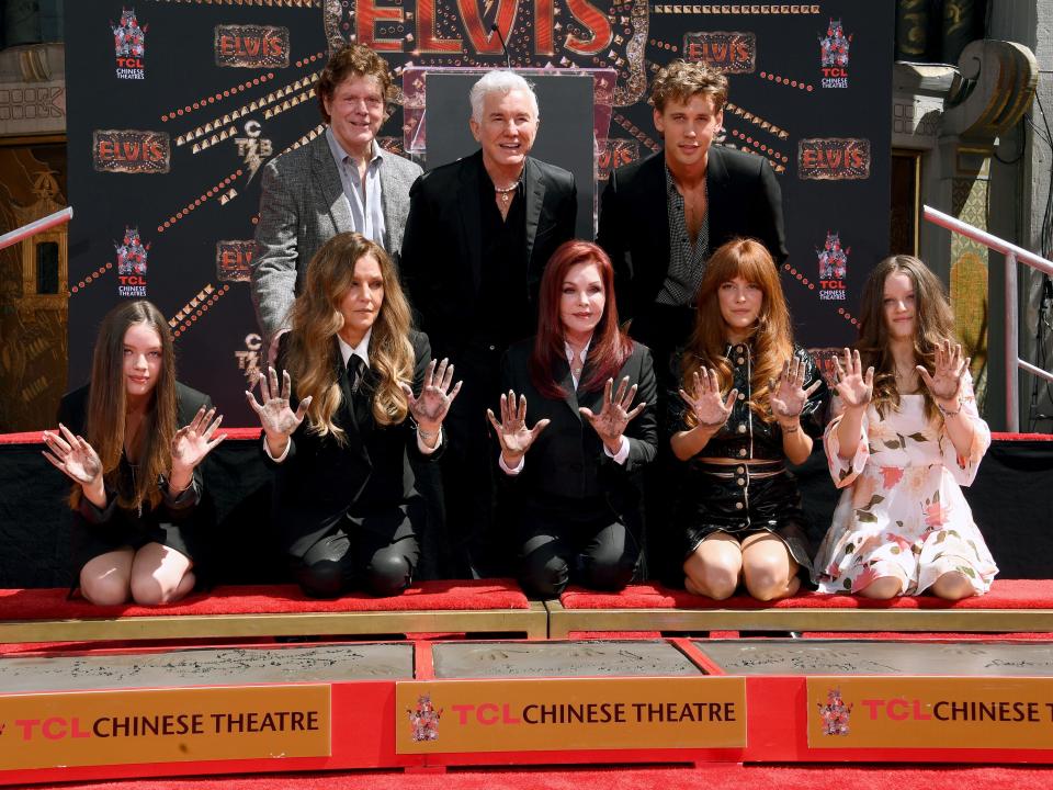 Steve Binder, Baz Luhrmann, Austin Butler, (Bottom L-R) Harper Vivienne Ann Lockwood, Lisa Marie Presley, Priscilla Presley, Riley Keough, and Finley Aaron Love Lockwood attend the Handprint Ceremony honoring Priscilla Presley, Lisa Marie Presley And Riley Keough at TCL Chinese Theatre on June 21, 2022 in Hollywood, California.