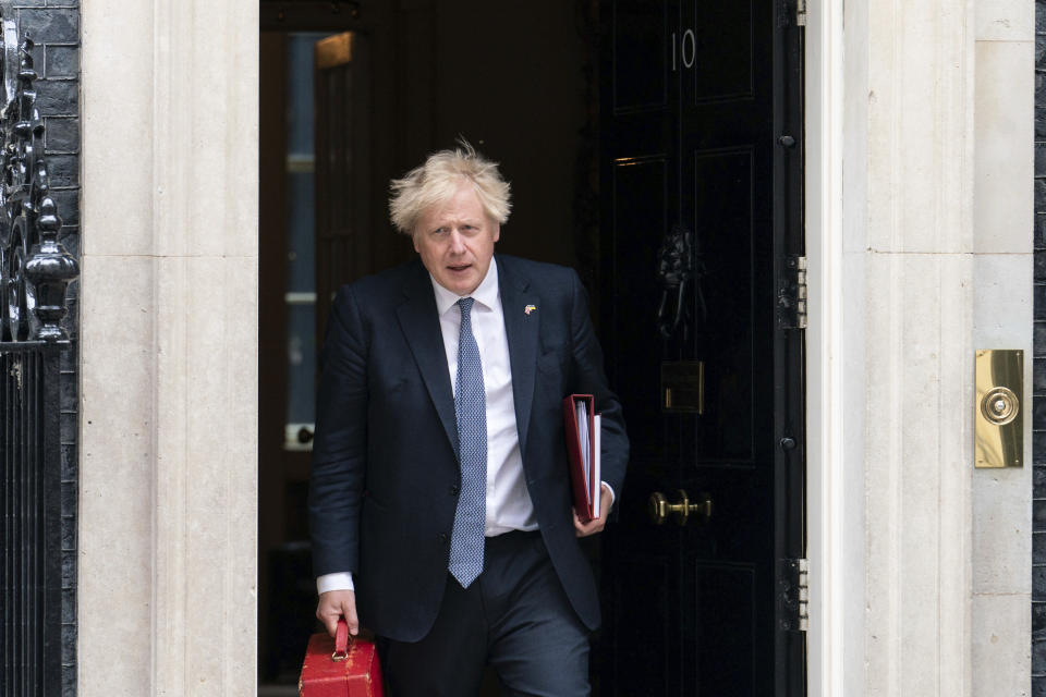 British Prime Minister Boris Johnson departs 10 Downing Street, London, Thursday May 26, 2022, the day after the publication of the Sue Gray report into parties in Whitehall during the coronavirus lockdown. (Dominic Lipinski/PA via AP)