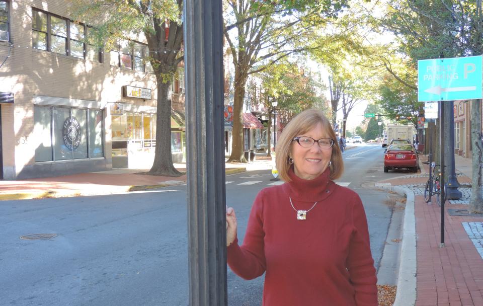 Diane Laird, executive director of the Downtown Dover Partnership, stands on Loockerman Street near Bradford Street in Dover.