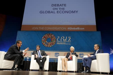 (L-R) Moderator Richard Quest, Brazil's Finance Minister Joaquim Levy, International Monetary Fund (IMF) Managing Director Christine Lagarde and Bank of England's Governor Mark Carney attend the "Debate on the Global Economy" session during the 2015 IMF/World Bank Annual Meetings in Lima, Peru, October 8, 2015. REUTERS/Guadalupe Pardo