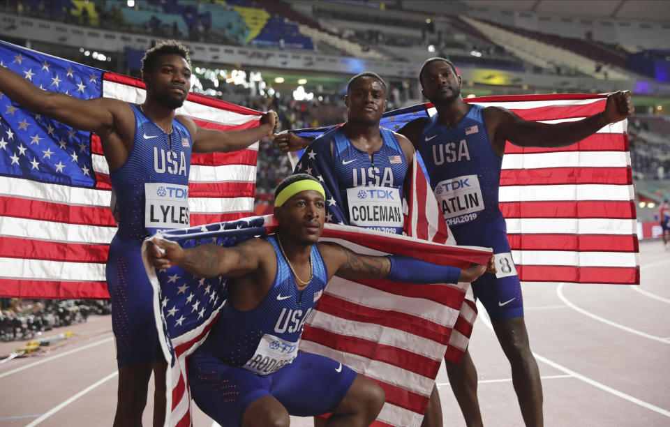 Gold medalists in the 4x100 relay from left, Noah Lyles, Michael Rodgers, Christian Coleman and Justin Gatlin, of the United States, celebrate at the World Athletics Championships in Doha, Qatar, Saturday, Oct. 5, 2019.(AP Photo/Hassan Ammar)