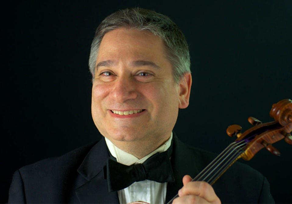 In this undated image, violinist Vincent Lionti poses for a portrait. Lionti played the violin for the Metropolitan Opera Orchestra for 33 seasons. He died April 4 from complications of the coronavirus. He was 60. (Metropolitan Opera via AP)