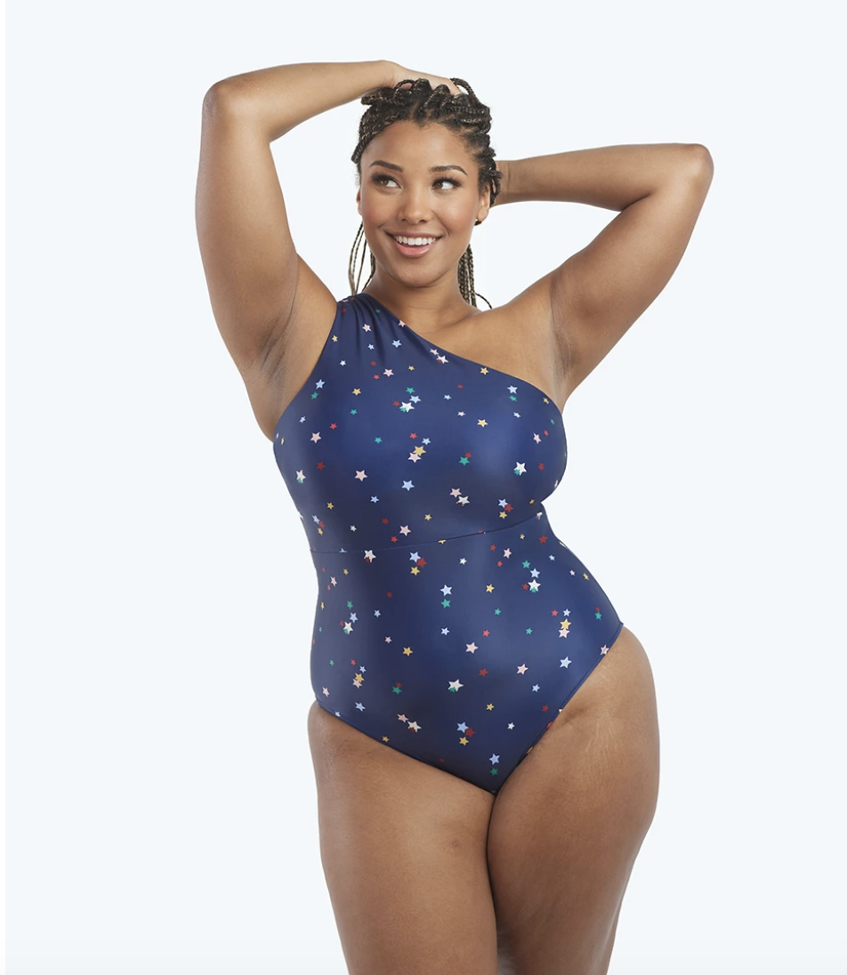 Cue the starry-eyed emoji. Summersalt released a limited-edition swim capsule with <a href="https://www.glamour.com/story/home-edit-favorites?mbid=synd_yahoo_rss" rel="nofollow noopener" target="_blank" data-ylk="slk:The Home Edit;elm:context_link;itc:0;sec:content-canvas" class="link ">The Home Edit</a>—and it's selling out fast, people. Snap up this cute printed piece while you can, featuring a strappy back, built-in cups, and full booty coverage. $125, Summersalt. <a href="https://www.summersalt.com/products/the-ruched-sidestroke-small-scatter-stars-in-deep-sea" rel="nofollow noopener" target="_blank" data-ylk="slk:Get it now!;elm:context_link;itc:0;sec:content-canvas" class="link ">Get it now!</a>