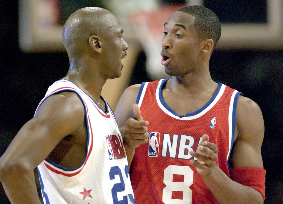 Washington Wizards Michael Jordan with the East All-Star Squad and and
Los Angeles Lakers Kobe Bryant with the West All-Star Squad chat during
the second half of the 52nd NBA All-Star game in Atlanta, February 9,
2003. The West All-Stars defeated the East All-Stars, 155-145.
REUTERS/Alan Mothner

TLC