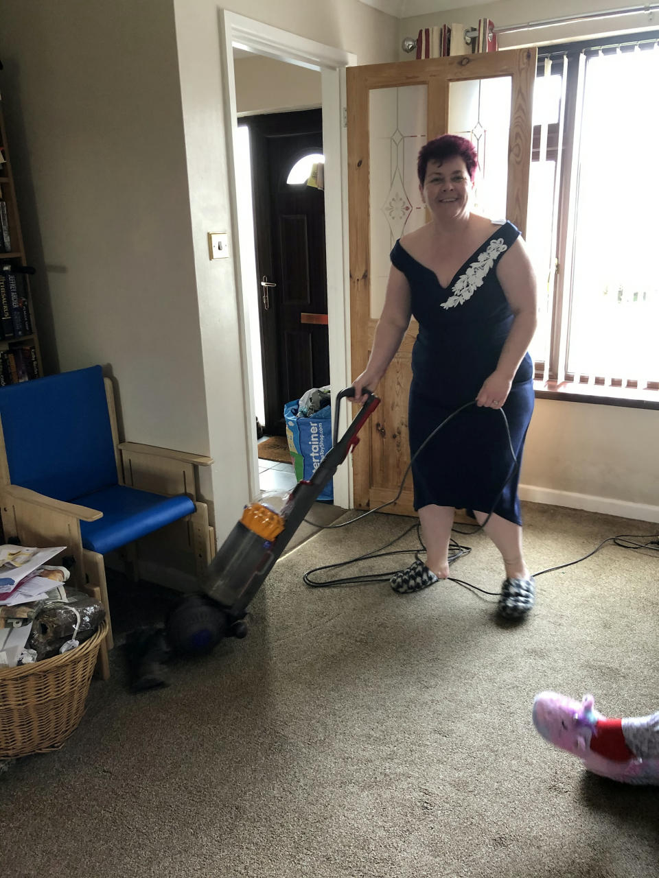 Hoovering in normal clothes is so overrated. (SWNS)