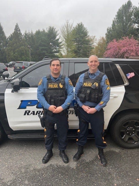 Raritan Township Police Officer Michael Podlaski, left, and Sgt. Aaron Roth
