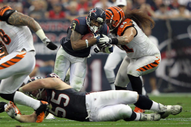 Texans win first playoff game, 31-10 over Bengals