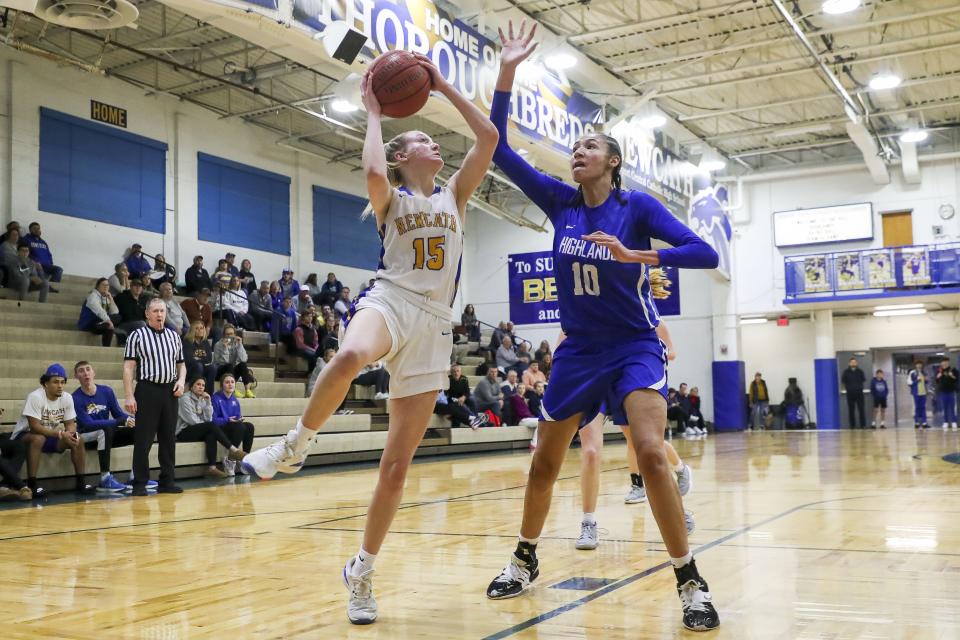 Marissa Green, right, of Highlands is the Division II Player of the year, guarding NewCath's Caroline Eaglin.