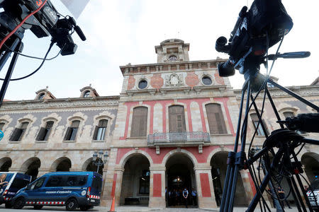 Television cameras are set up outside the regional assembly in Barcelona, Spain October 10, 2017. REUTERS/Gonzalo Fuentes