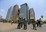 Riot policemen disperse supporters of the opposition National Super Alliance (NASA) coalition participating in a demonstration calling for the removal of Independent Electoral and Boundaries Commission (IEBC) officials in Nairobi, Kenya September 26, 2017. REUTERS/Thomas Mukoya