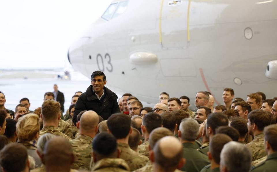 Rishi Sunak, the Prime Minister, is pictured this morning speaking to personnel at RAF Lossiemouth in Moray, Scotland