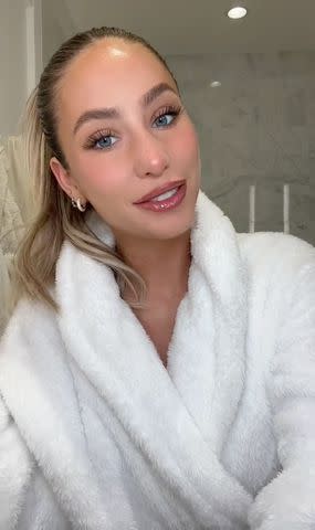 <p>alixearle/TikTok</p> Alix Earle shares a "GRWM" before she attends Miami Dolphins game to support Braxton Berrios