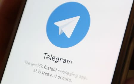 FILE PHOTO: The Telegram logo is seen on a screen of a smartphone in this picture illustration taken April 13, 2018. REUTERS/Ilya Naymushin