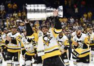 <p>Pittsburgh Penguins center Sidney Crosby (87) hoists the Stanley Cup after defeating the Nashville Predators in Game 6 of the 2017 Stanley Cup Final at Bridgestone Arena. Credit: Christopher Hanewinckel-USA TODAY Sports </p>