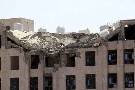 The Yemeni Football Association building, which was damaged in a Saudi-led air strike, is seen in Sanaa May 31, 2015. REUTERS/Mohamed al-Sayaghi