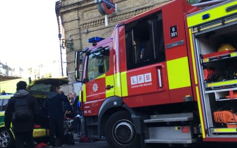 emergency services attending an incident at Parsons Green station  - Credit: Richard Aylmer-Hall/PA