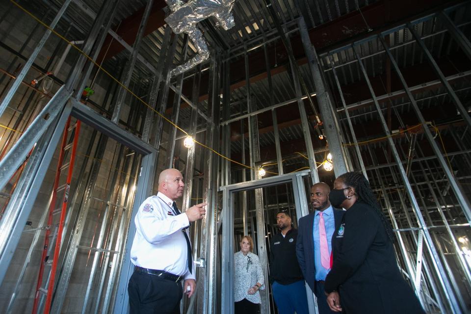 Riviera Beach Fire Rescue Chief John Curd gives a tour of Riviera Beach's new fire station under construction at 1920 W. Heron Blvd to City Council member Julia Botel, center, City Manager Jonathan Evans, and City Council members Tradrick McCoy and KaShamba Miller-Anderson prior to the start of a construction topping off ceremony for the building on Wednesday, November 2, 2022, in Riviera Beach, FL.