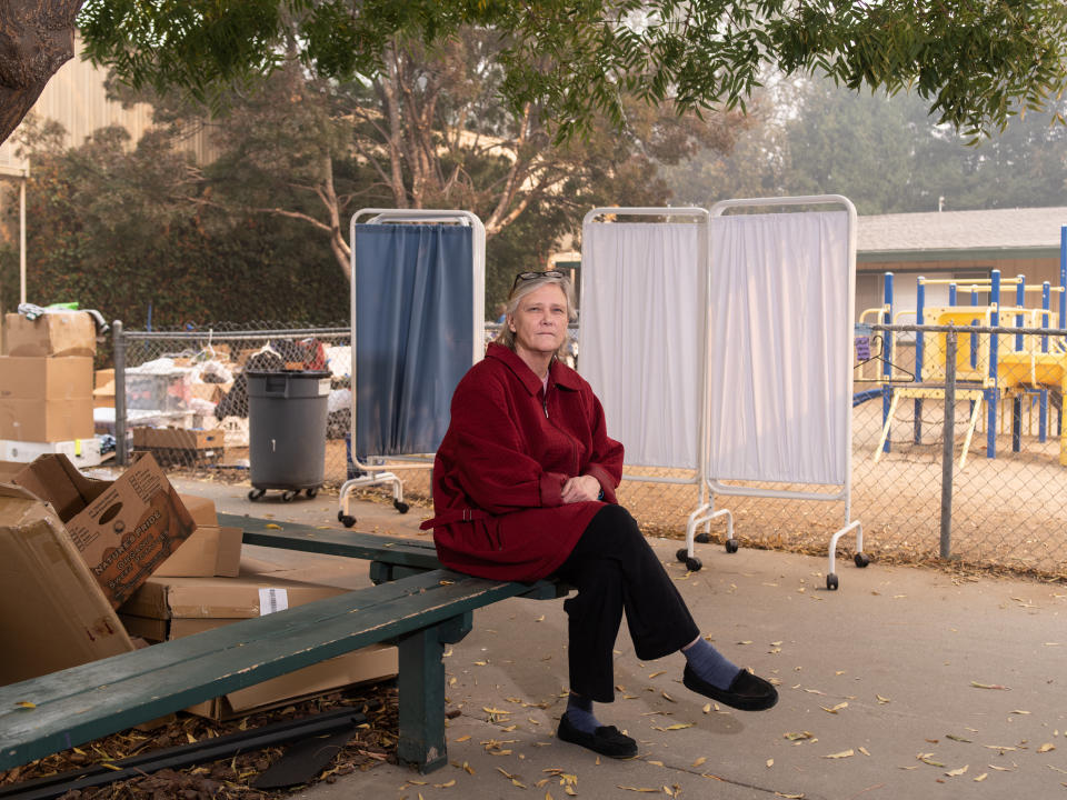 Libby Andresen outside of the shelter at East Ave Church. Andresen, her mother and brother were evacuated from their homes in Paradise, California. (Photo: Cayce Clifford for HuffPost)