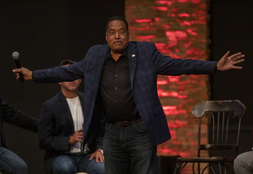 DOWNEY, CA - SEPTEMBER 09, 2021: Gubernatorial candidate Larry Elder gestures to the audience while participating in a town hall meeting at New Season LA/Downey Church in Downey. (Mel Melcon / Los Angeles Times)