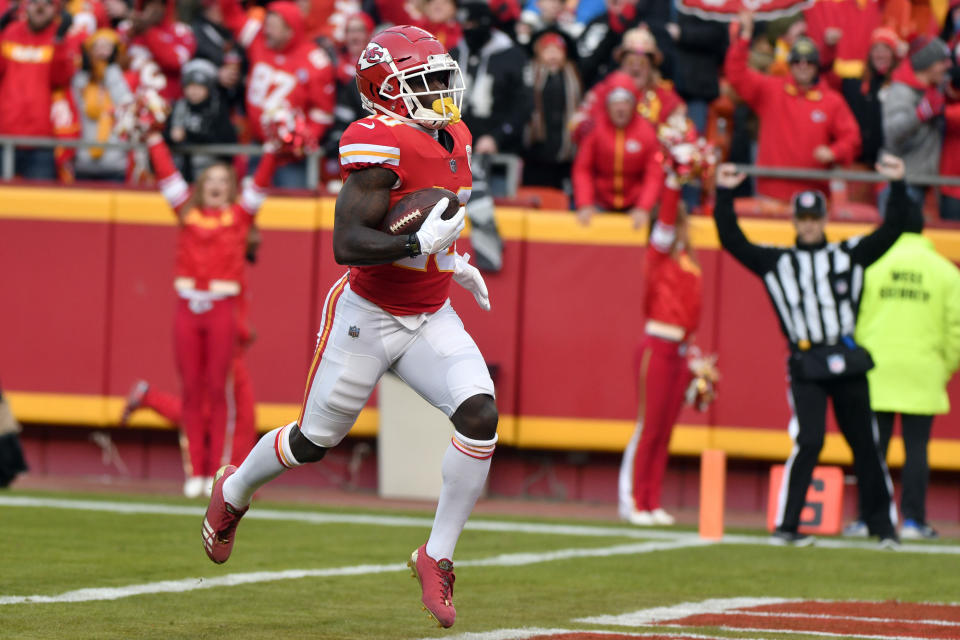 Kansas City Chiefs wide receiver Tyreek Hill (10) runs into the end zone for a touchdown during the first half of an NFL football game against the Oakland Raiders in Kansas City, Mo., Sunday, Dec. 30, 2018. (AP Photo/Ed Zurga)