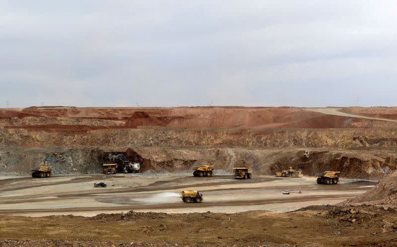 FILE PHOTO: Mining trucks are seen at the Oyu Tolgoi mine in Mongolia's South Gobi region