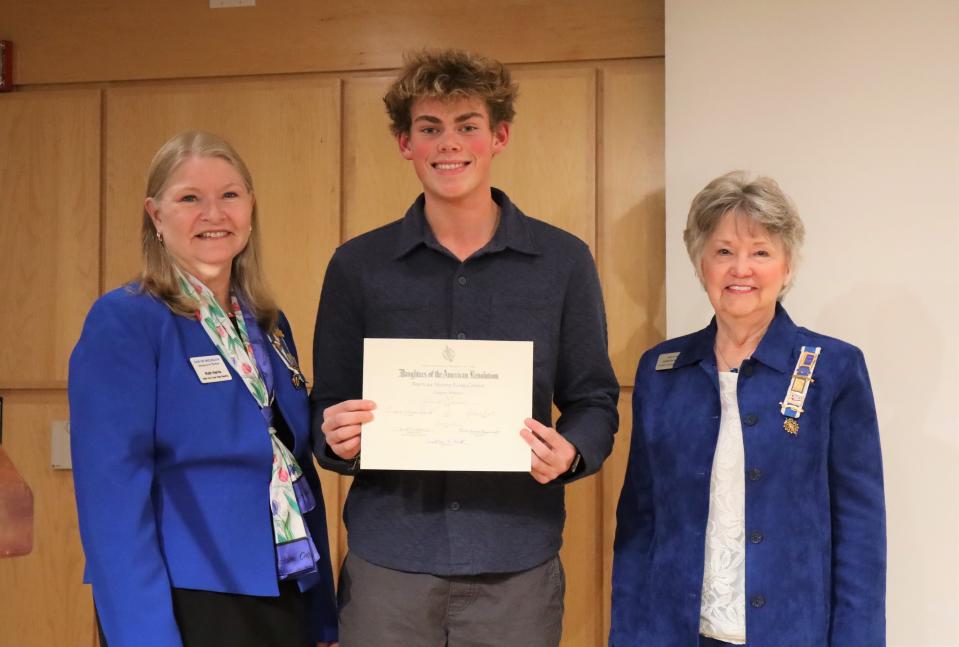 From left to right: Chapter Vice Regent Ruth Harris, award recipient Henry Mulder and DAR American History Essay Contest Chairperson Judith Hemwall.