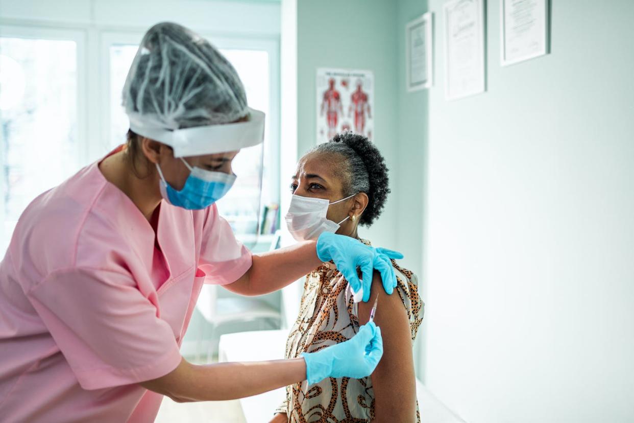 <span class="caption">Researchers are working to develop vaccines that provide long-term immune protection from COVID-19. </span> <span class="attribution"><a class="link " href="https://www.gettyimages.com/detail/photo/senior-woman-getting-vaccinated-royalty-free-image/1303314299?adppopup=true" rel="nofollow noopener" target="_blank" data-ylk="slk:Marko Geber/Digital Vision via Getty Images;elm:context_link;itc:0;sec:content-canvas">Marko Geber/Digital Vision via Getty Images</a></span>