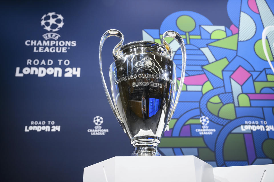The Champions League trophy is pictured during the quarter-final draw of the UEFA Champions League 2023/24, at the UEFA Headquarters in Nyon, Switzerland, Friday, March 15, 2024. (Jean-Christophe Bott/Keystone via AP)